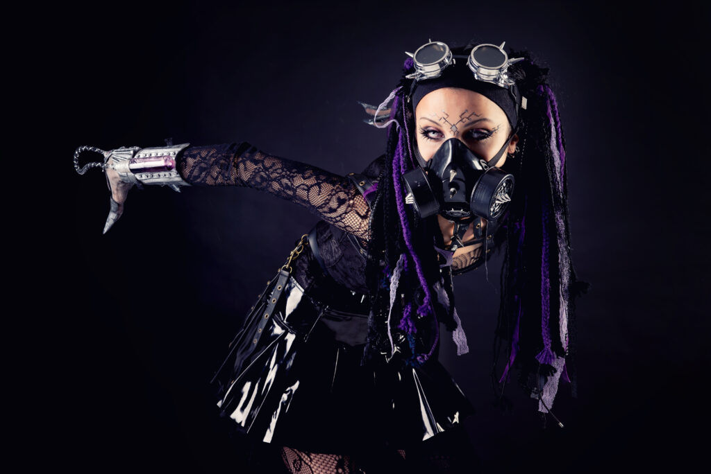 cyber goth girl isolated on a dark background